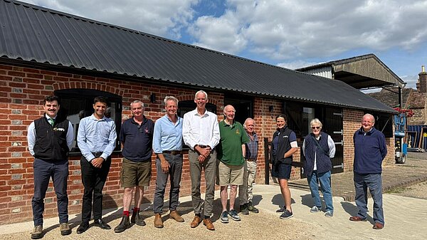 John with local farmers