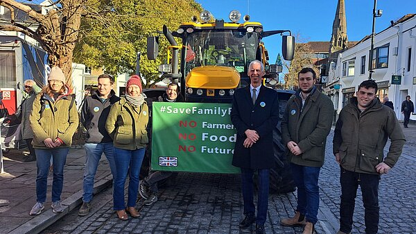 John Milne with farmers in the Carfax